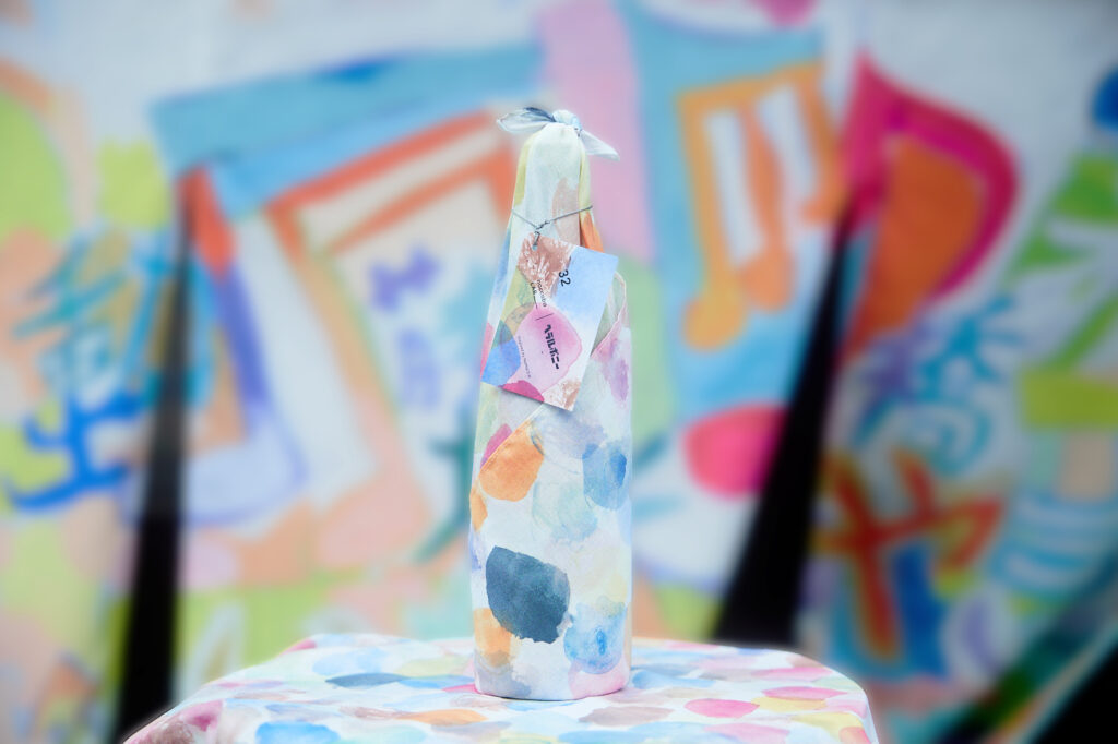 福島県浪江町に笑顔と希望を咲かせる！ ヘラルボニーとhaccobaによるアート暖簾と新商品「Fuuu!do」誕生！